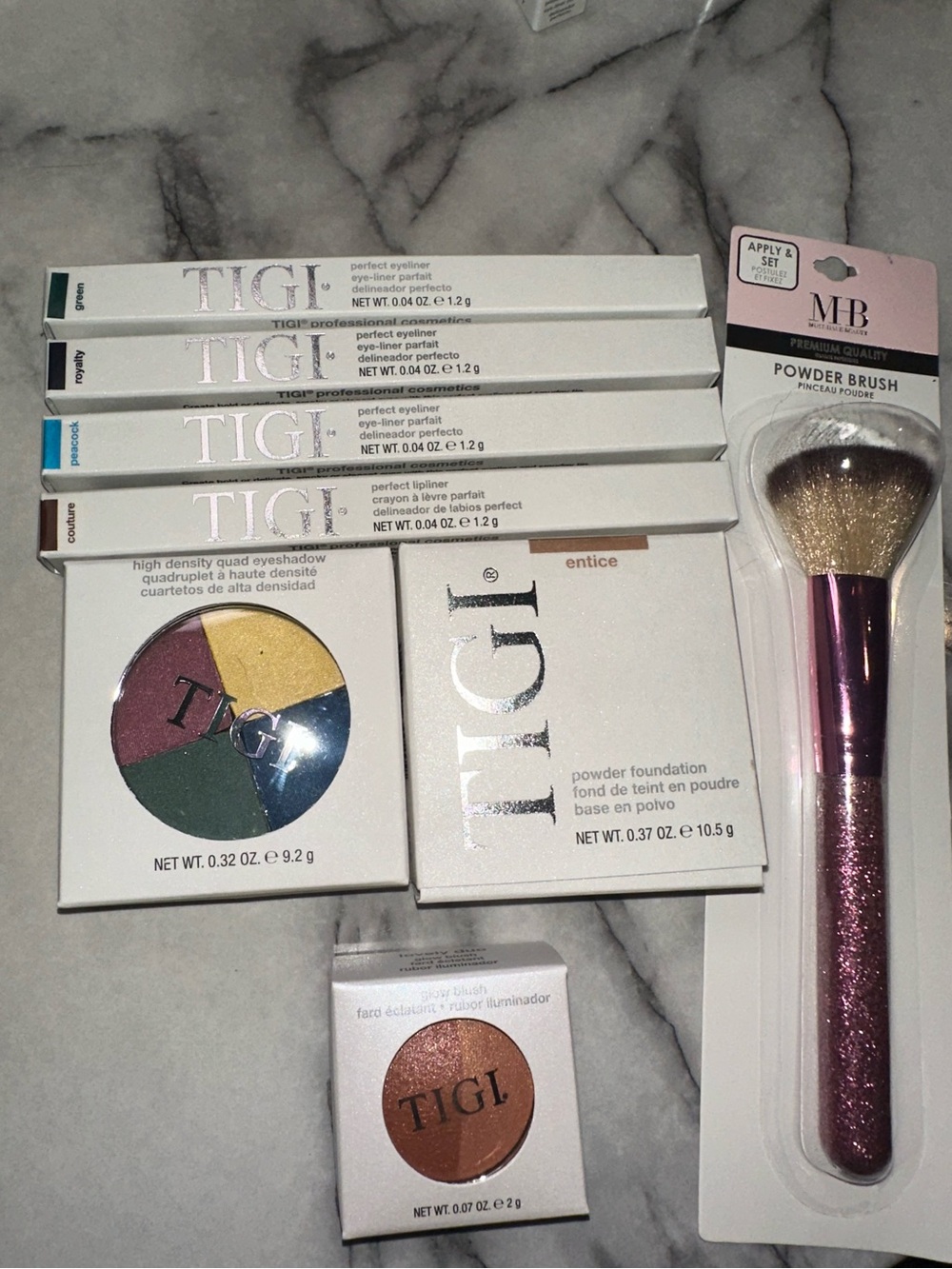 TIGI eyeshadow pallet,3 eyeliners,1 lipliner,glow blush, blush brush,foudation